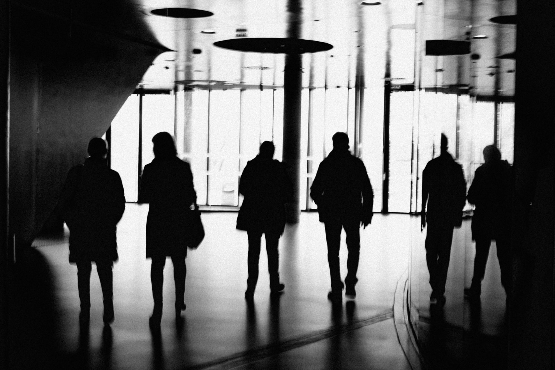 People walking in silhouette