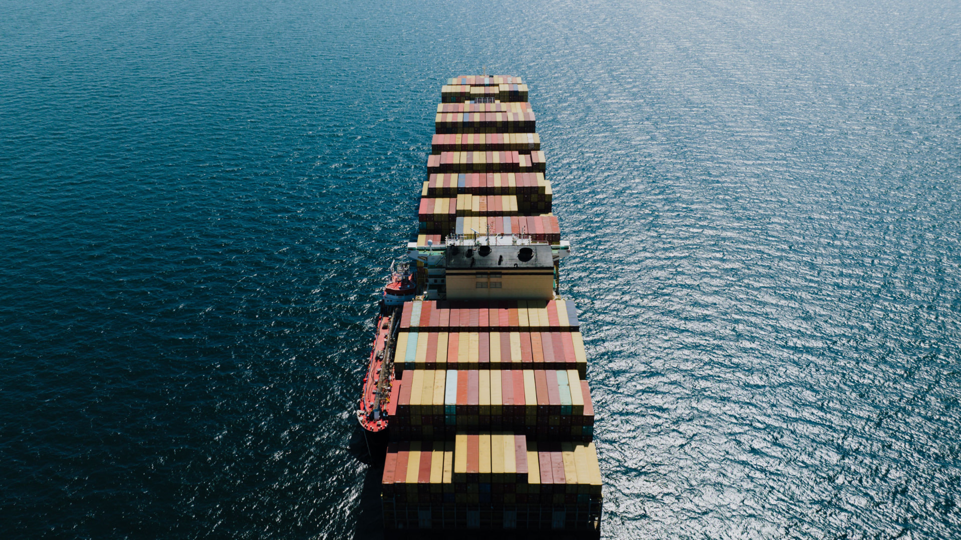 Container ship at sea seen from above